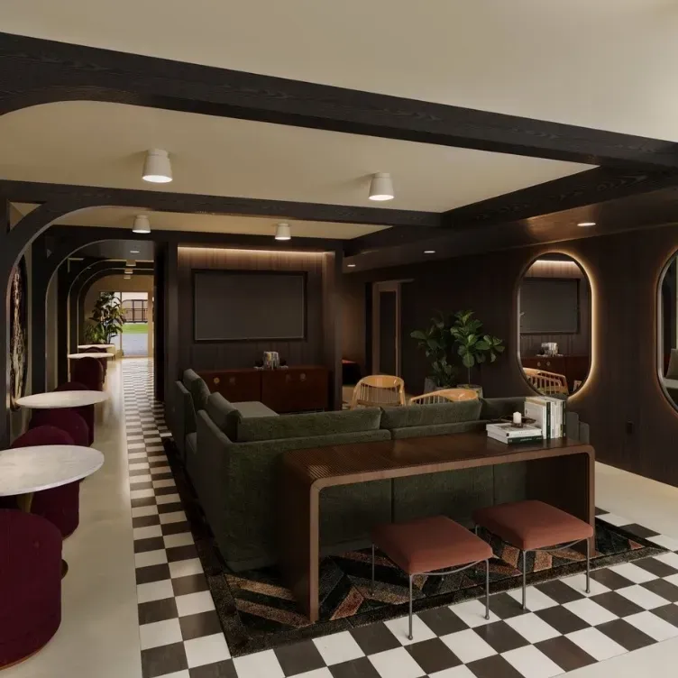 Rendering of the resident lounge: a green sectional, marble café tables, arched dark-wood doorways and a black-and-white checkered floor.