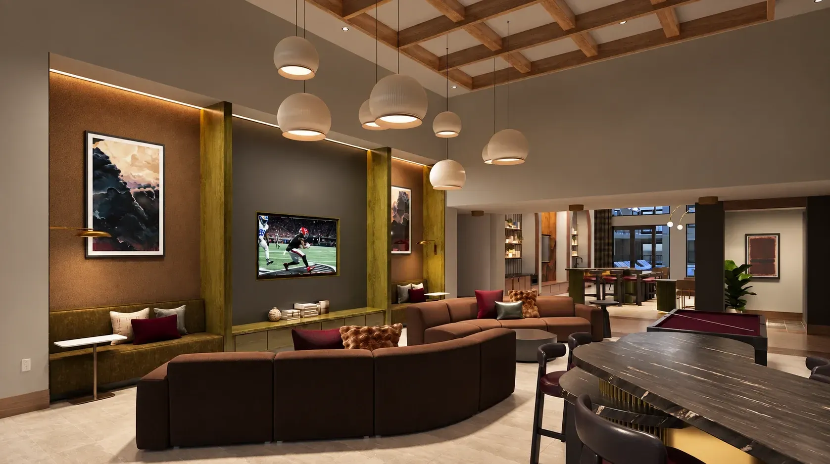 Modern luxury club room with curved sectional sofa, pendant lighting, and decorative wall alcoves in warm tones.