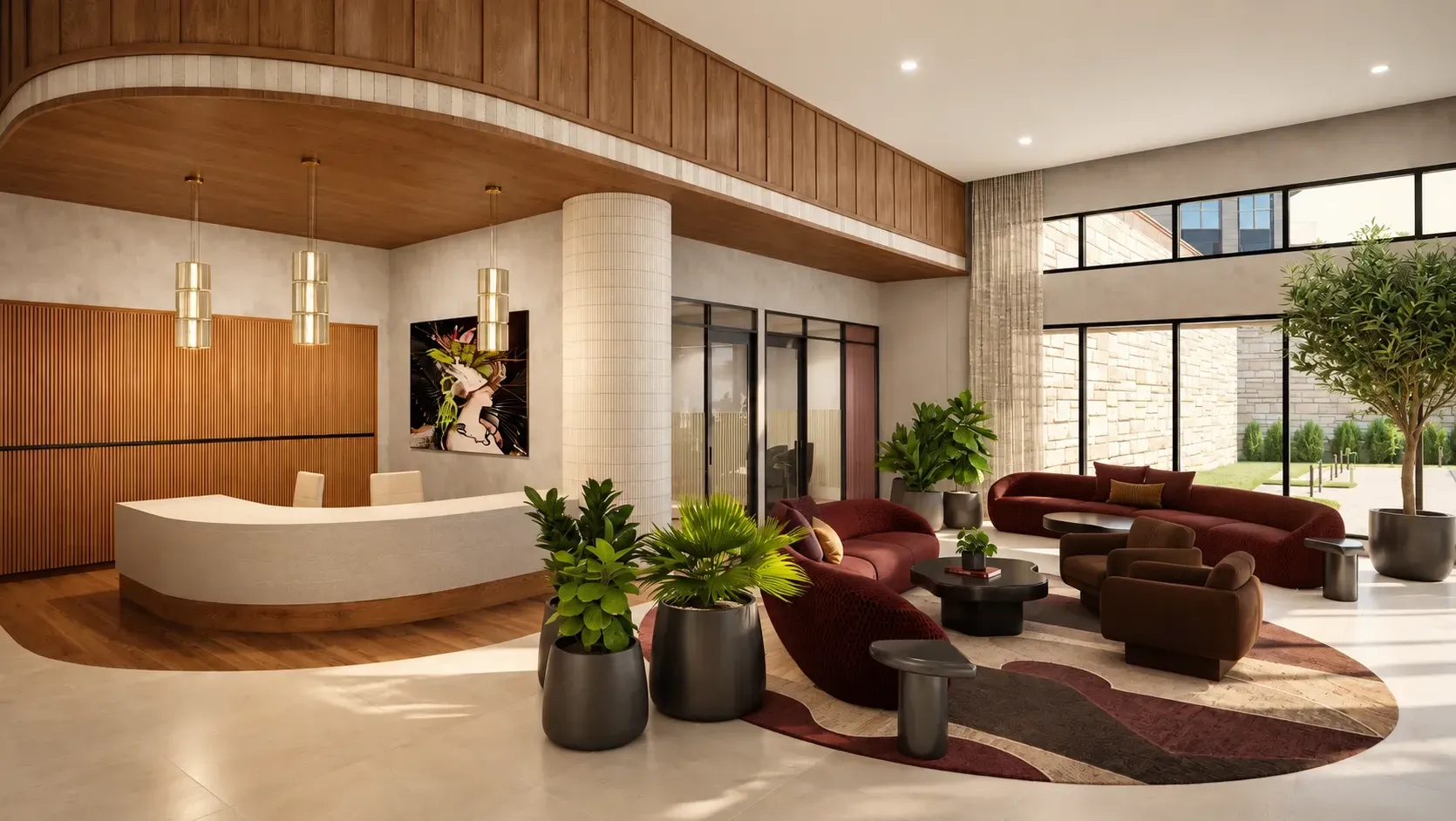 Summit Heights lobby with a curved reception desk, burgundy seating, wood ceiling and floor-to-ceiling windows